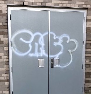Before-Graffiti Removal_United Mobile Power Wash & Pressure Washing Services_Commercial_Southfield Michigan Metal Door